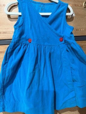 Eve Turquoise-Blue Corduroy Wrap Dress with Red Buttons